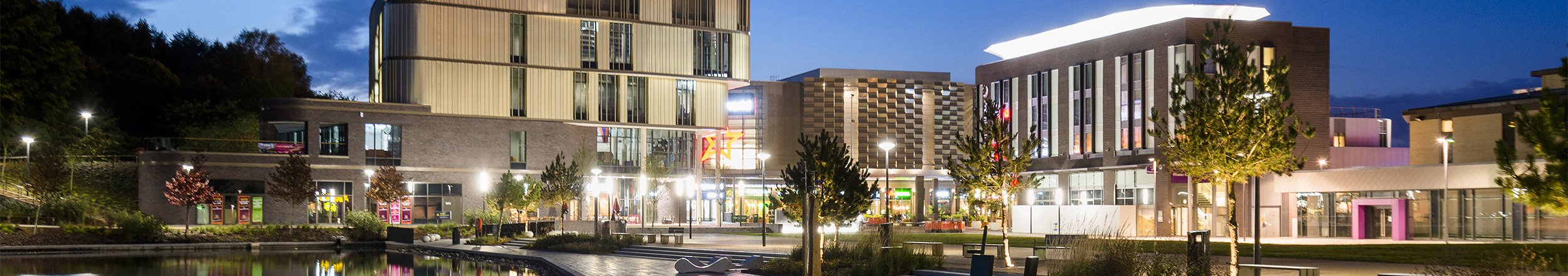 A photograph of Southwater Square at night